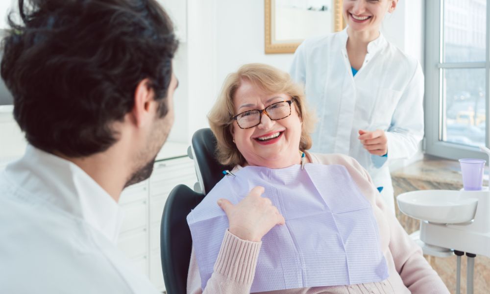 A patient engaging in a comfortable and pain-free dental procedure at Friedman Dental, showcasing the clinic’s commitment to painless dental techniques.