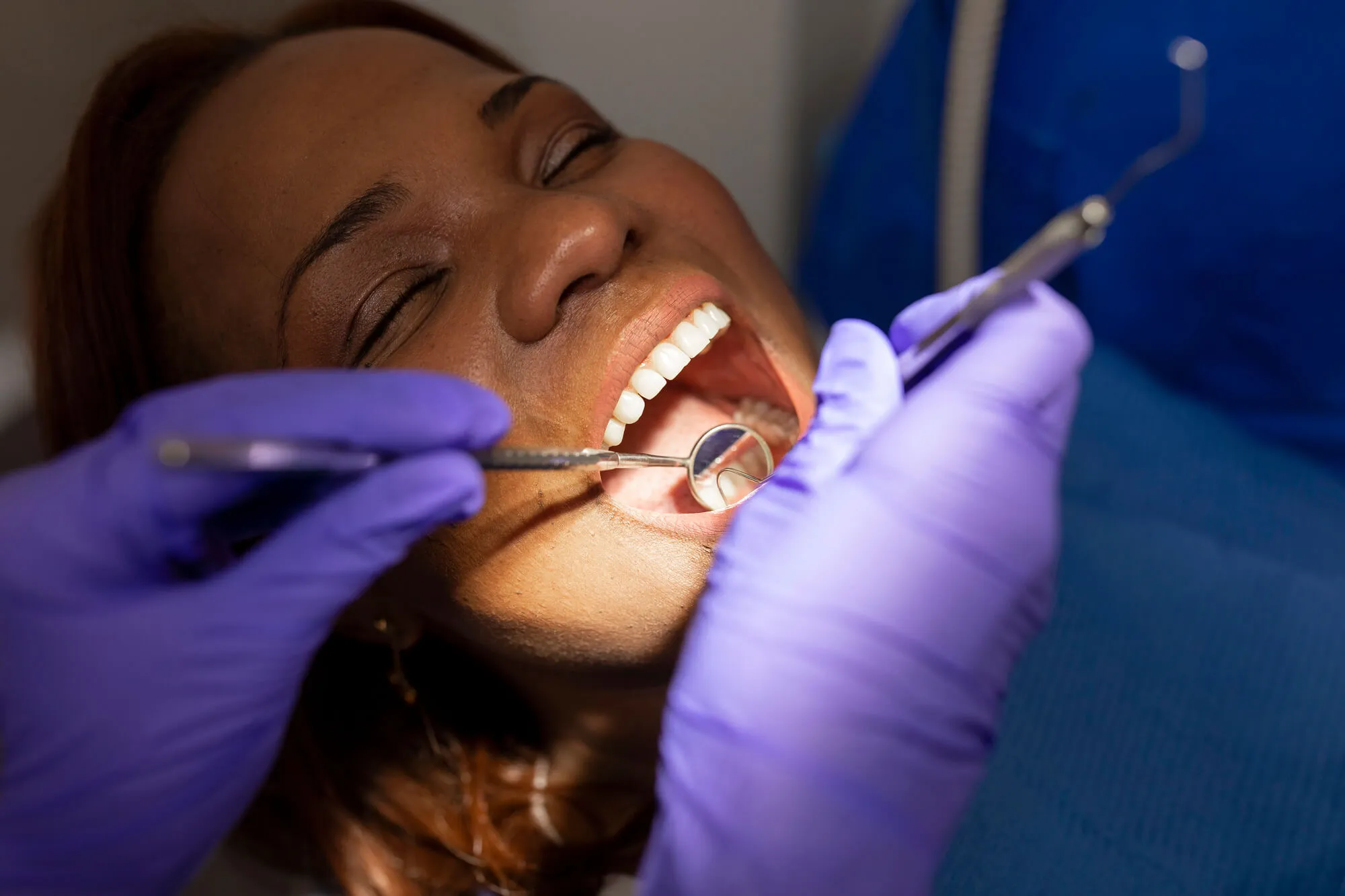 patient gets miami dental cleaning