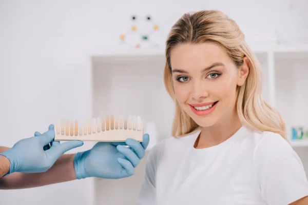 Cosmetic Dentist Miami talking to patient