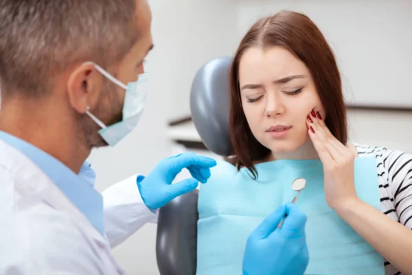 emergency dentist coral springs interviewing patient