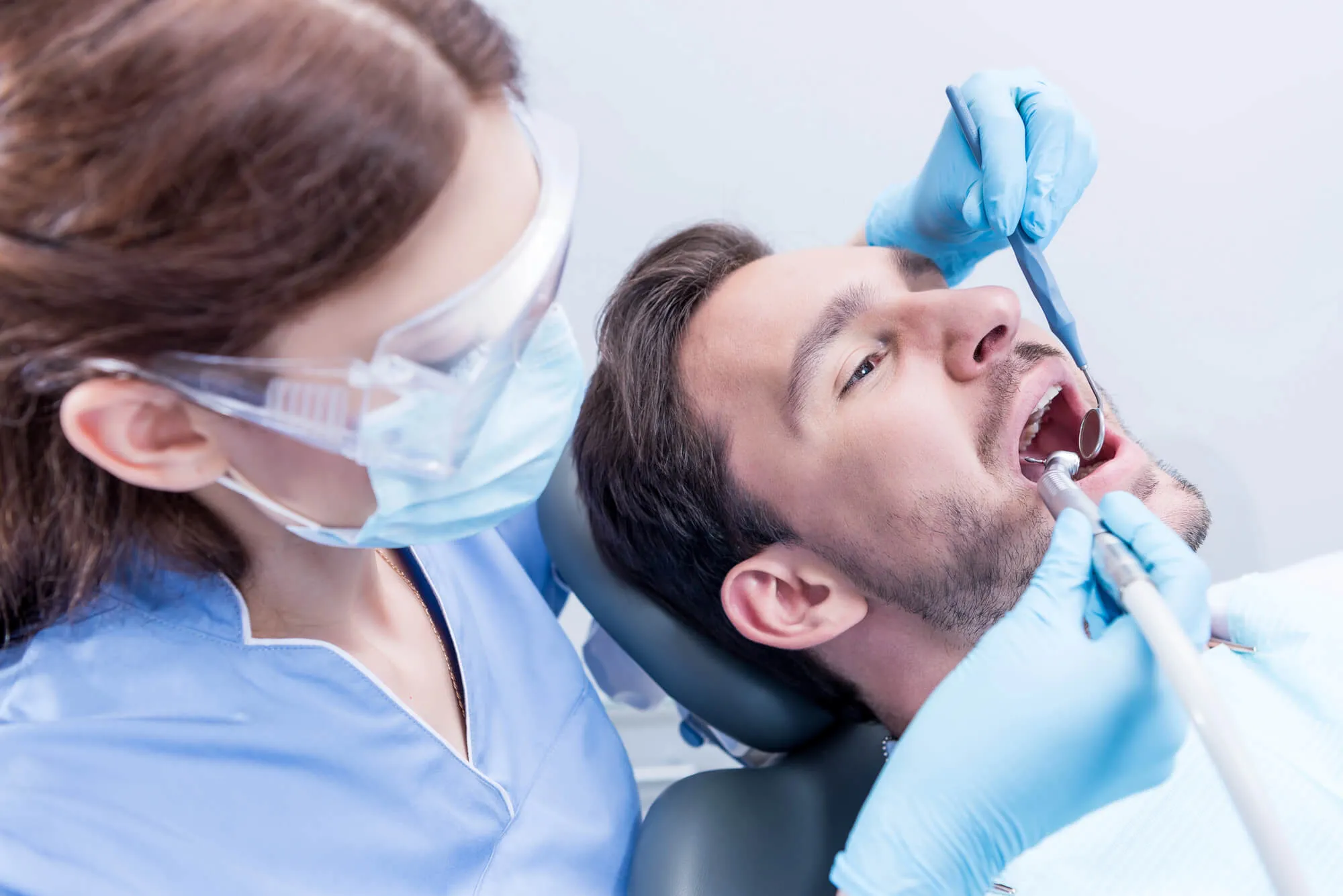 man getting Dental Implants Miami