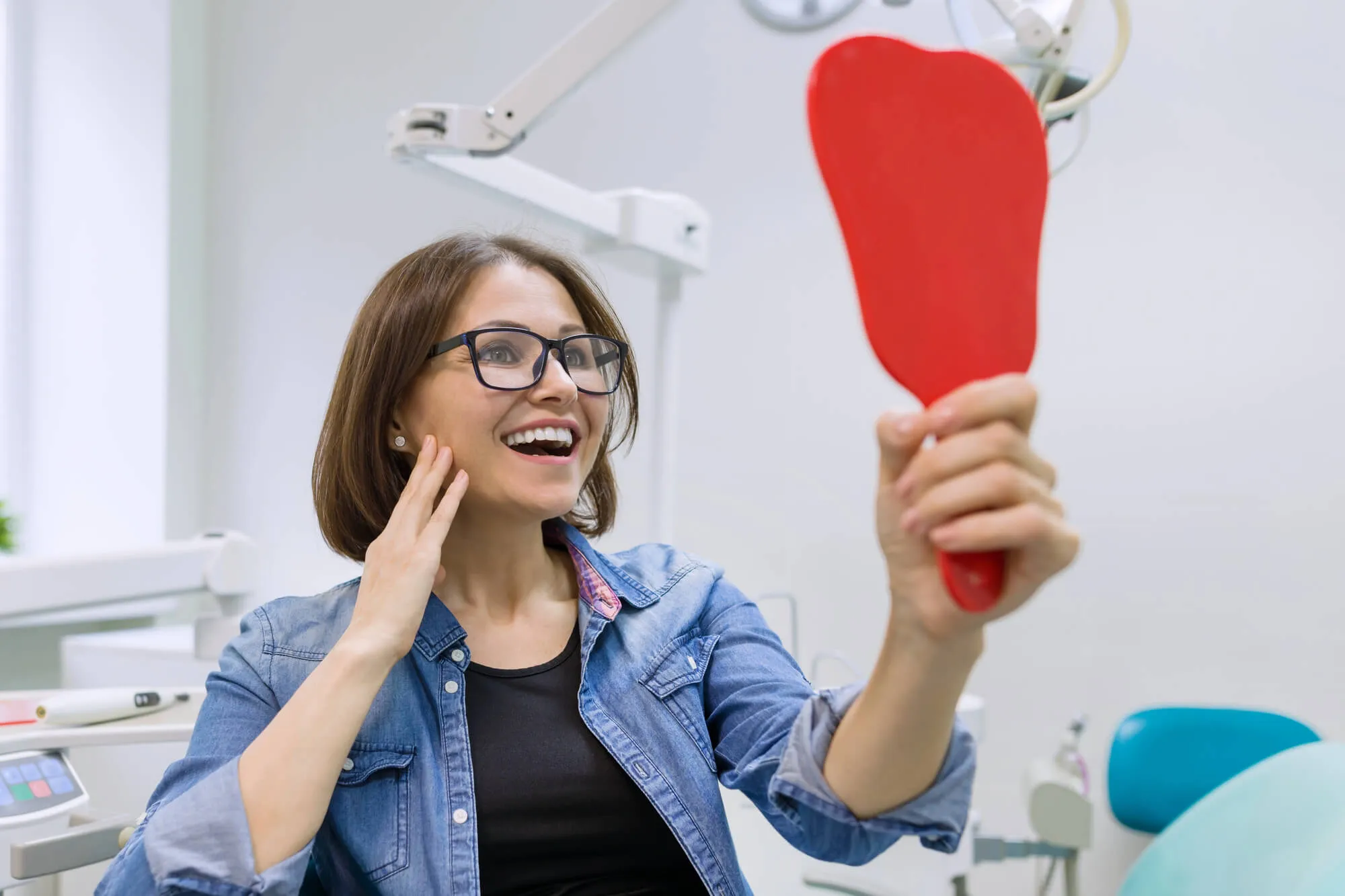 patient satisfied with her dental implants tamarac