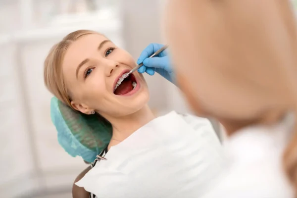 dentist lauderhill performign routine exam
