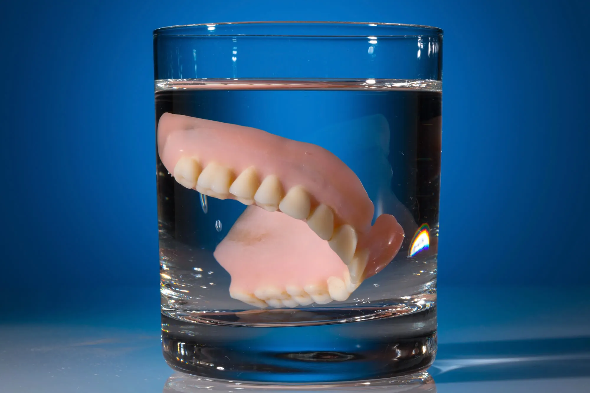 dentures tamarac inside glass