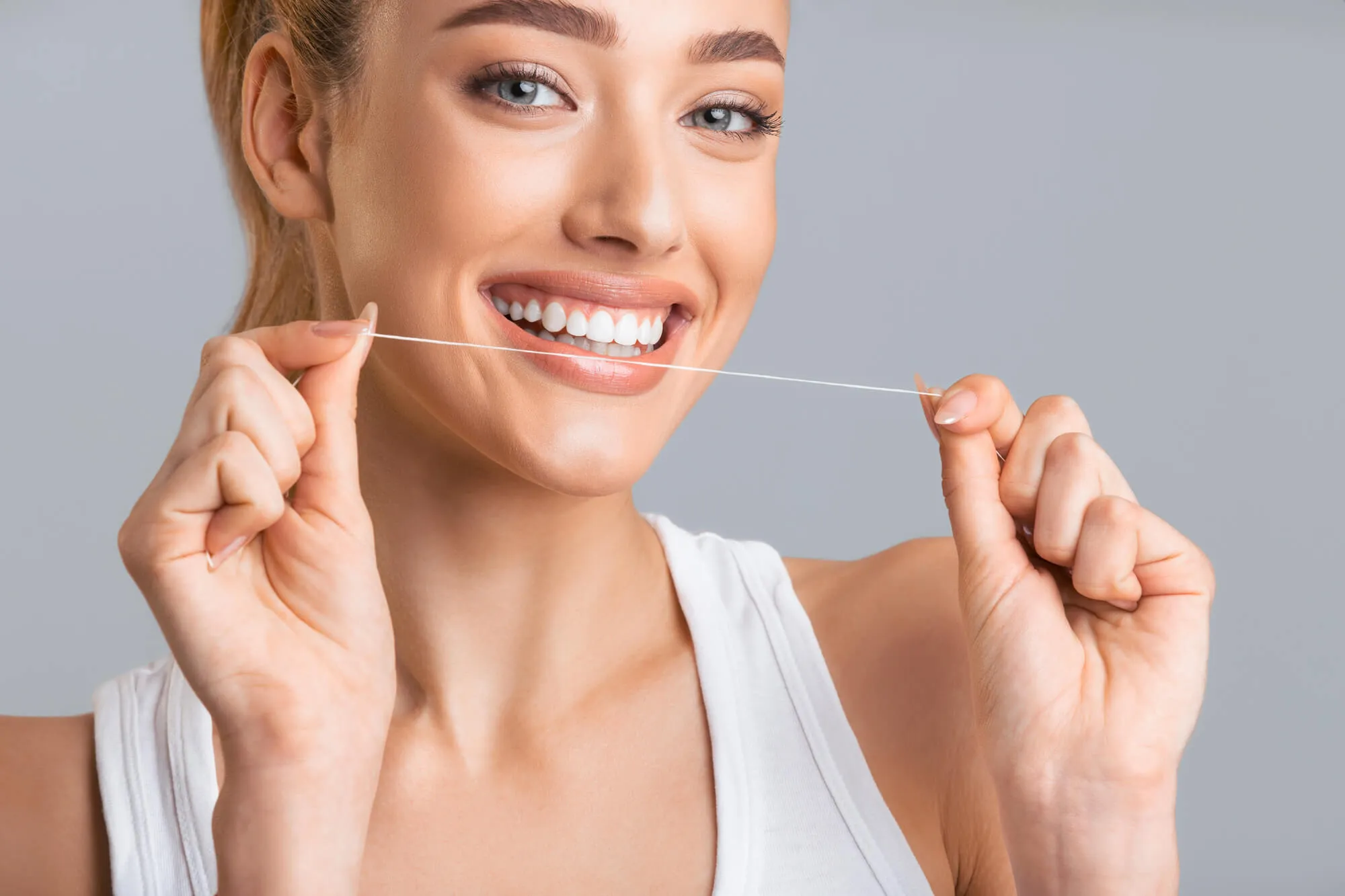 flossing as directed by dentist coral springs